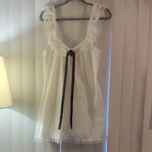 Lace-Trim White Mini Dress with Black Ribbon